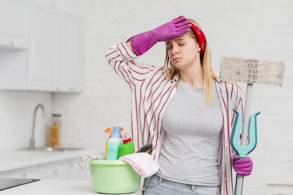 woman tired from cleaning home